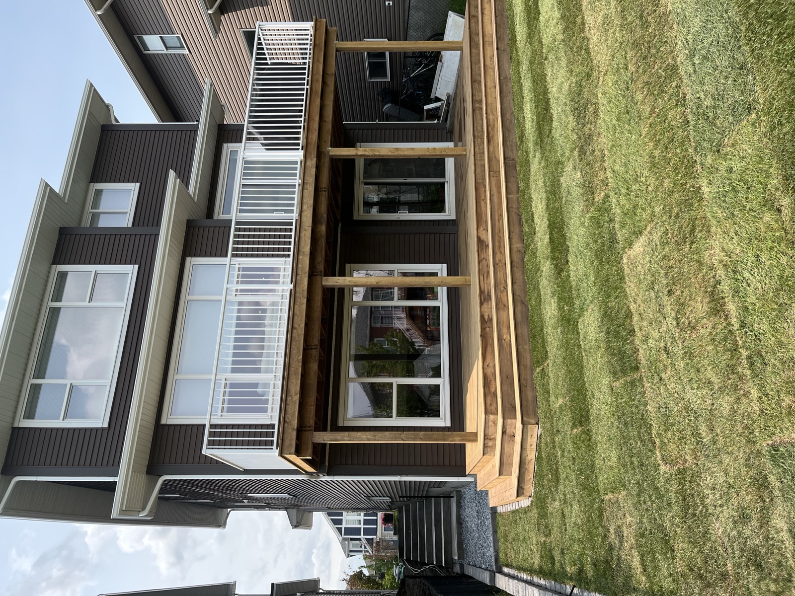 Custom exterior living space with elevated deck